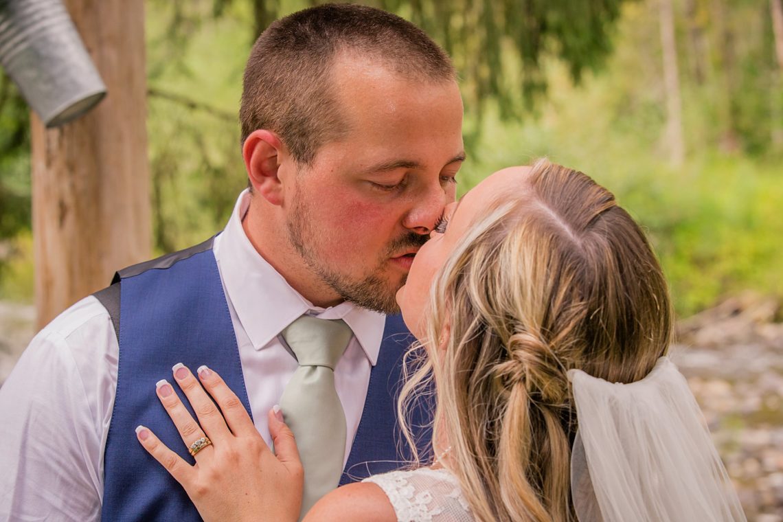 River Valley Oasis Wedding kiss